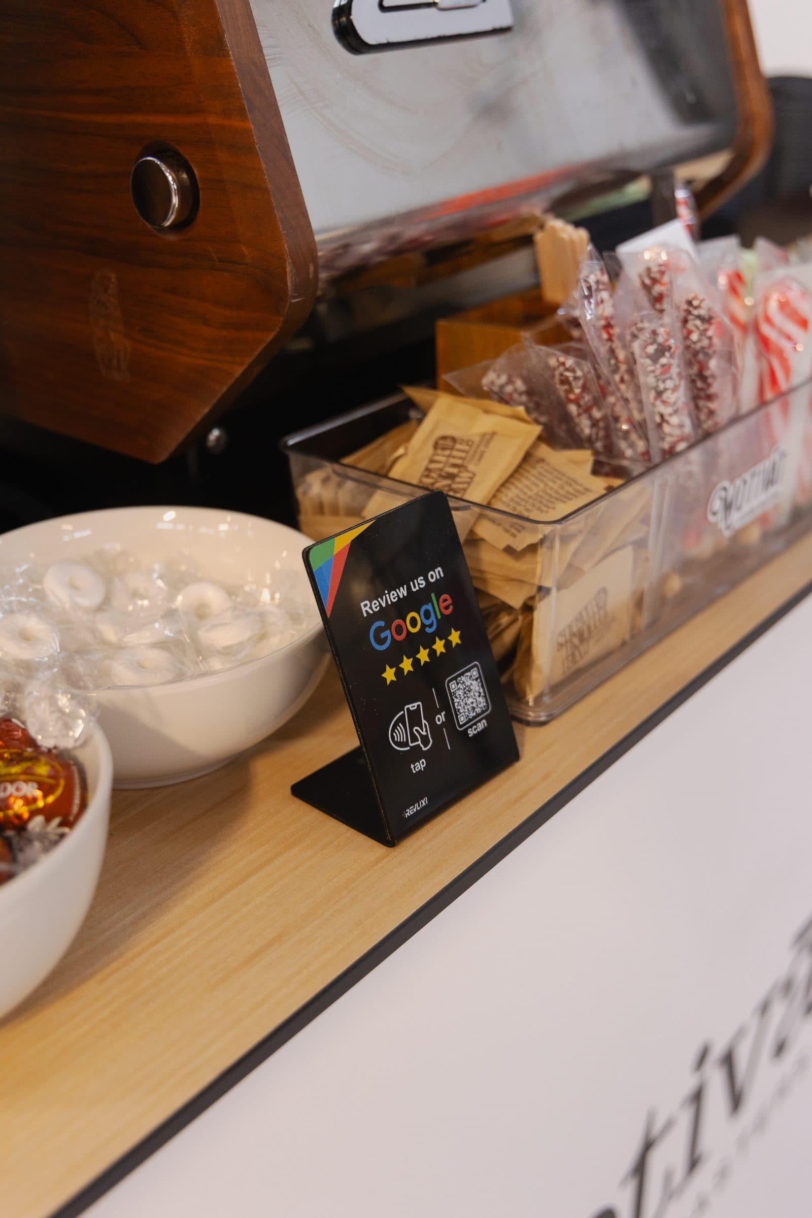 Condiment and service station on the Motivāt coffee catering cart